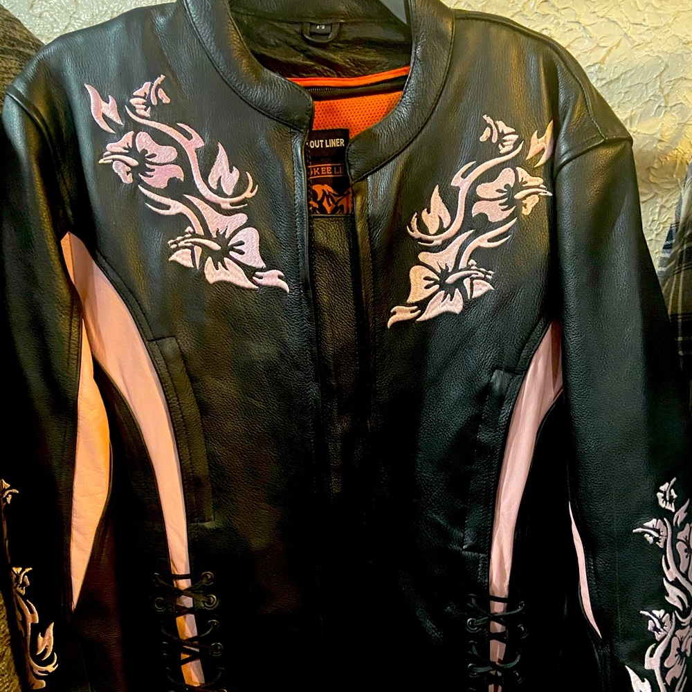 Women’s Harley leather riding jacket, size medium, never warn